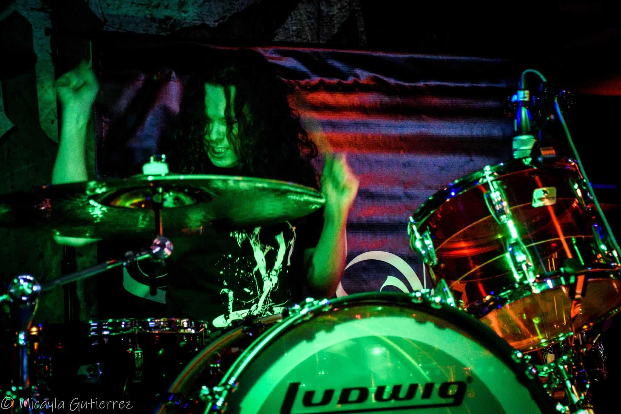 Zachariah Menich - Drummer performing live