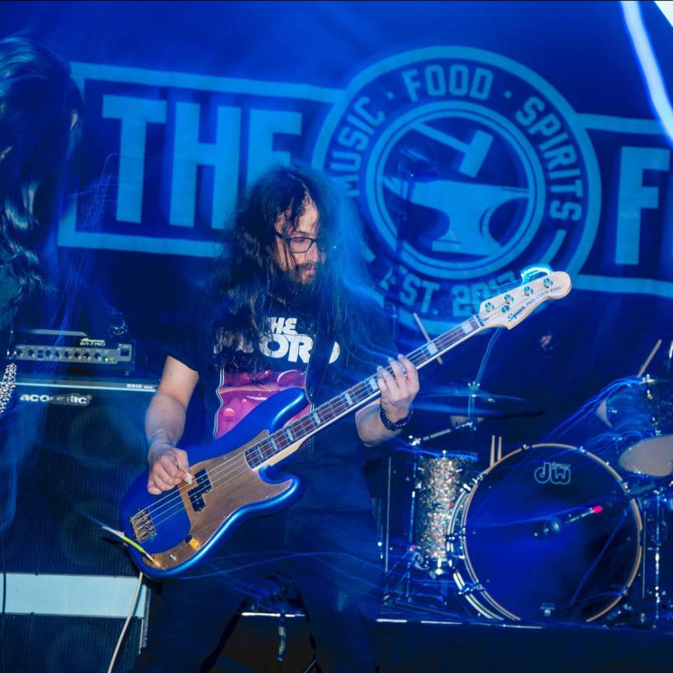 Zack - Bassist performing live